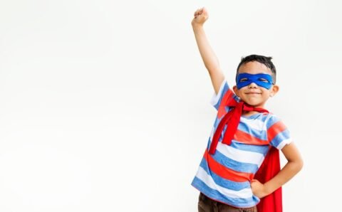 little-boy-playing-superhero-playground_53876-46868